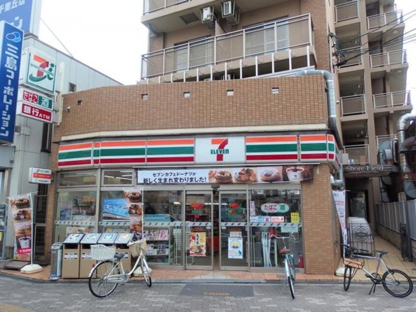 セブンイレブン摂津千里丘2丁目店磯の屋(コンビニ)まで254m※セブンイレブン摂津千里丘2丁目店磯の屋 近畿ビル