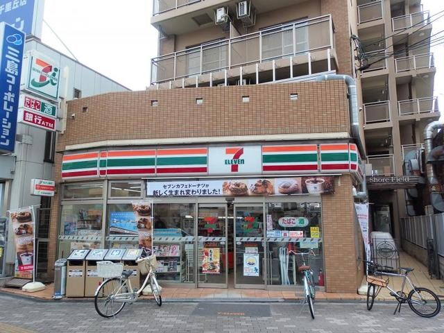 セブンイレブン摂津千里丘2丁目店磯の屋(コンビニ)まで281m※セブンイレブン摂津千里丘2丁目店磯の屋 グレースハイム光