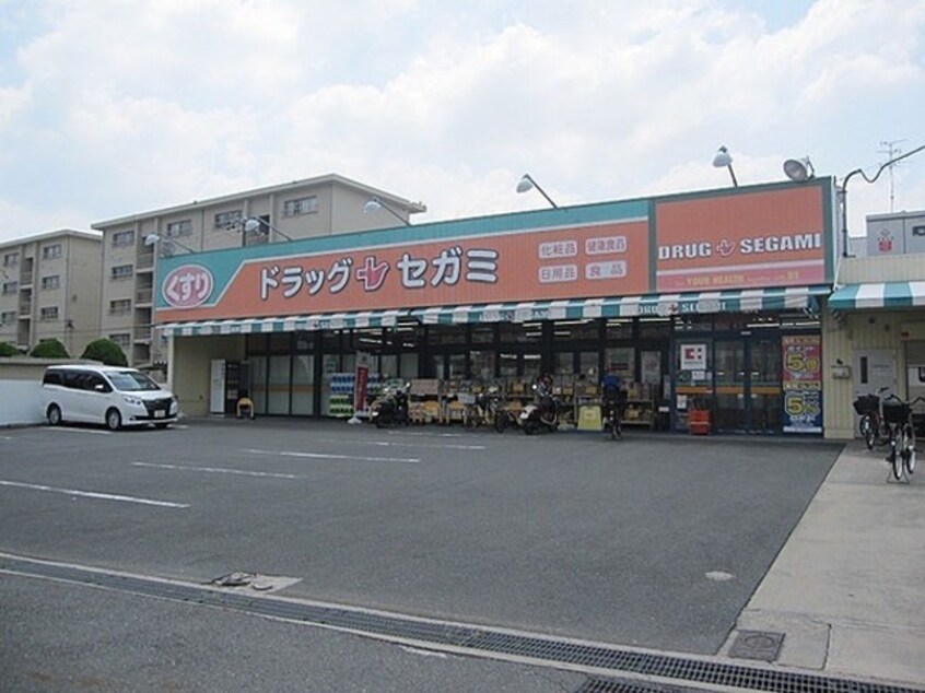 ドラッグセガミ南江口店(ドラッグストア)まで990m※ドラッグセガミ南江口店 クレール相川