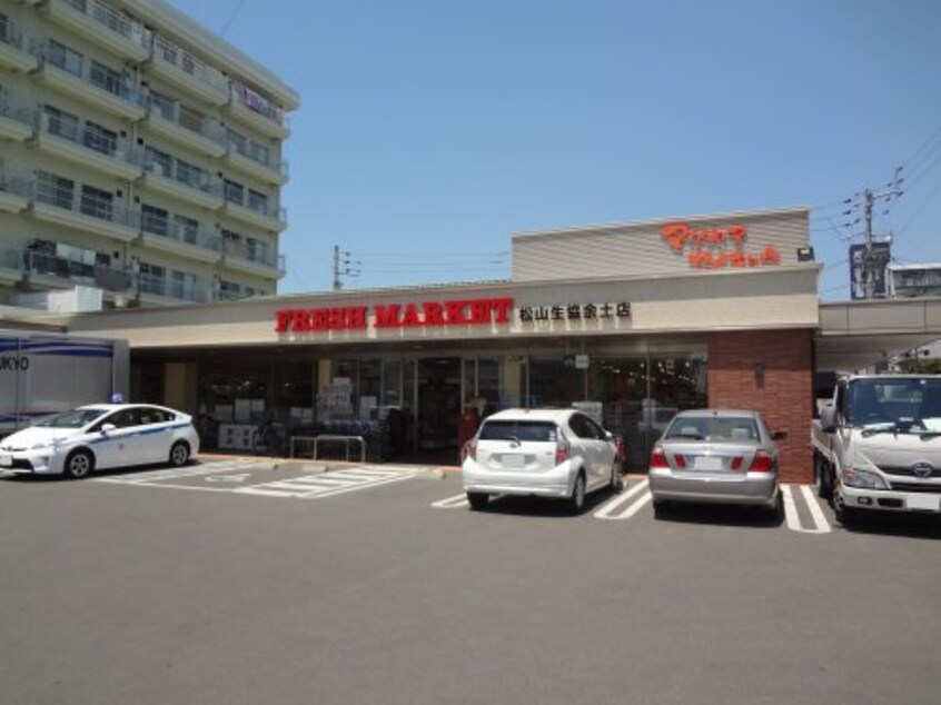 松山生協 余土店(スーパー)まで1085m カーサ余戸南