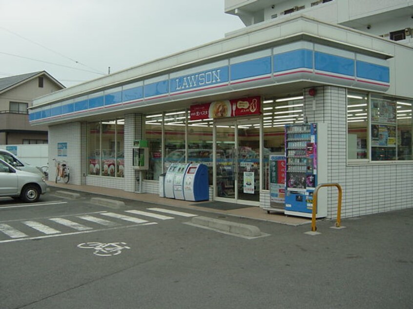 ローソン重信横河原店（コンビニ）まで830ｍ プランドール・カネキB棟