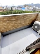 暖かな日差しのふりそそぐバルコニー コンフォート麻生