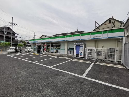 ファミリーマート 富田林津々山台店(コンビニ)まで354m エステートI