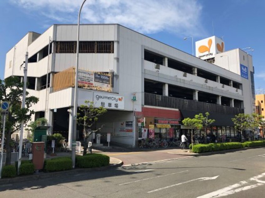 グルメシティ深井駅前店(スーパー)まで1014m テキューロクアトロ