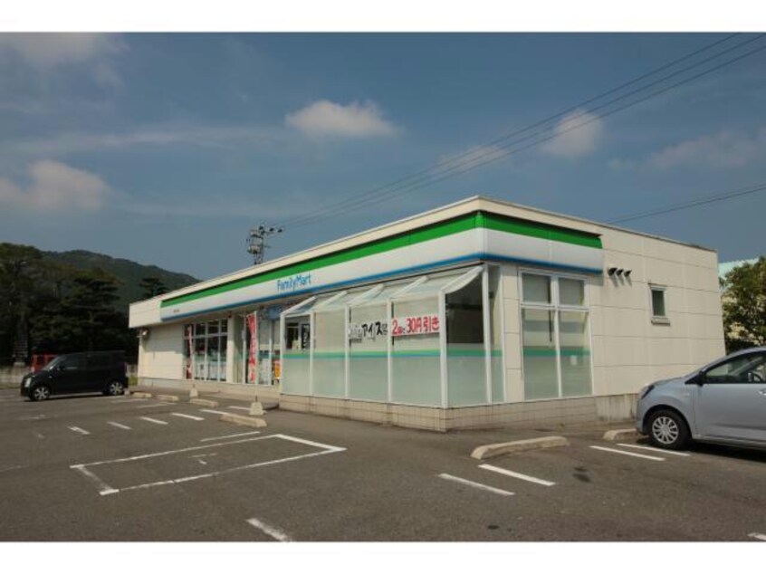 ファミリーマート唐津千々賀店(コンビニ)まで994m ウイングコート