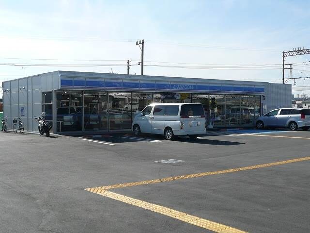 ローソン和歌山北消防署前店様(コンビニ)まで815m コンフィアンス　Ａ棟