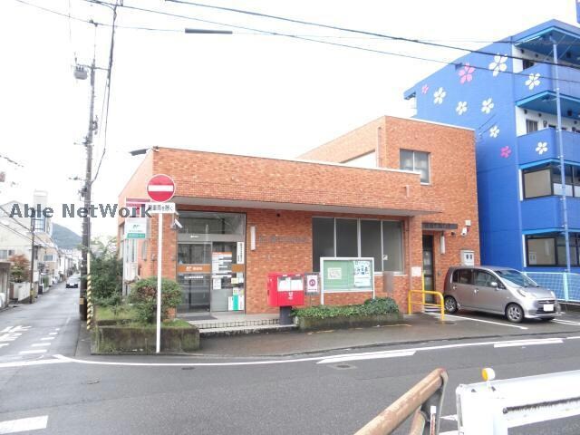 松山御幸町郵便局(郵便局)まで200m 清水マンション