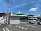 ファミリーマート交野倉治西店(コンビニ)まで190m サンライズⅢ
