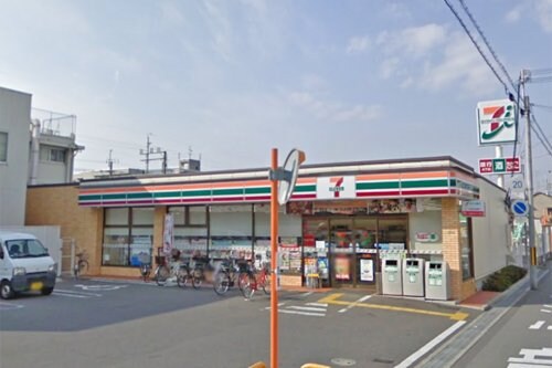 セブン-イレブン 豊中千成町店(コンビニ)まで1883m セレニティ加島A棟