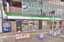 ファミリーマート 庄内駅前店(コンビニ)まで492m ドルチェヴィータ豊中