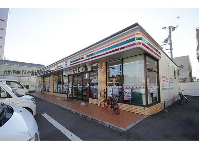 セブンイレブン高崎下中居町西店(コンビニ)まで383m プレミールＡ・Ｂ（高崎市下之城町）