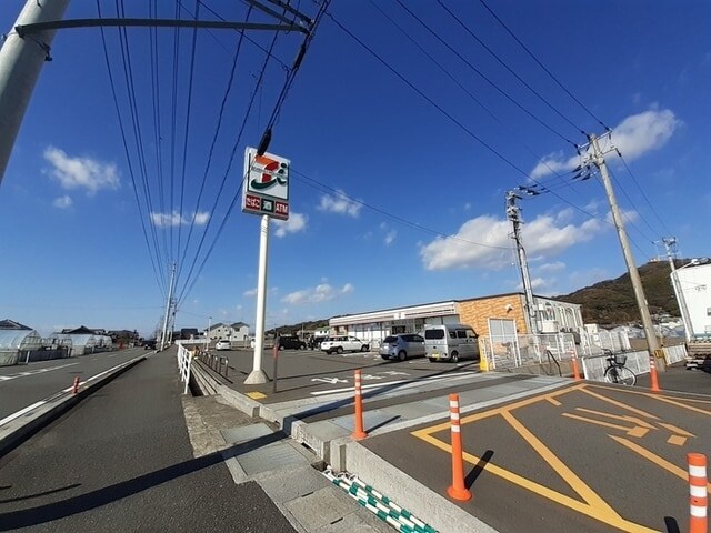 セブンイレブン のいち東野店(コンビニ)まで385m ワンパースンハイツ