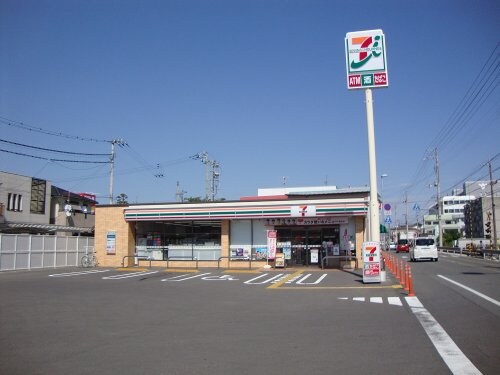 セブンイレブン 南国篠原店(コンビニ)まで842m 野村ハイツ