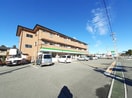 ファミリーマート 土佐山田新町丸店(コンビニ)まで290m メゾンボヌール A棟