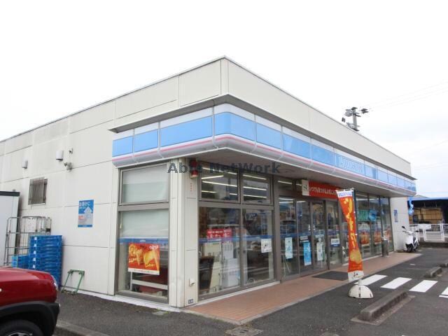 ローソン都城年見町店(コンビニ)まで522m サンリット栄　Ａ・Ｂ