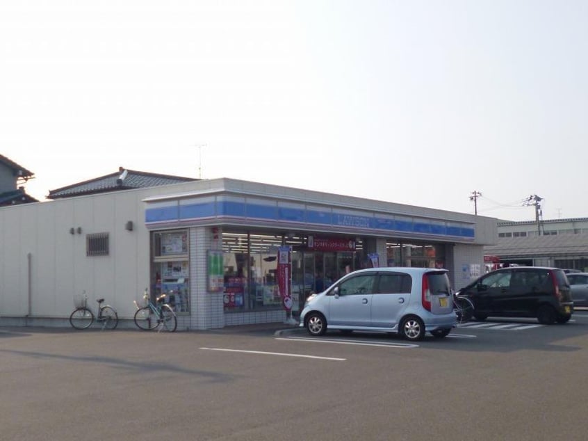 ローソン新潟白根七軒店(コンビニ)まで743m グランシェールＣ・Ｄ