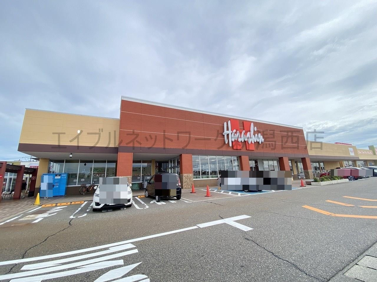 原信亀貝店(スーパー)まで581m ミライズテラス亀貝