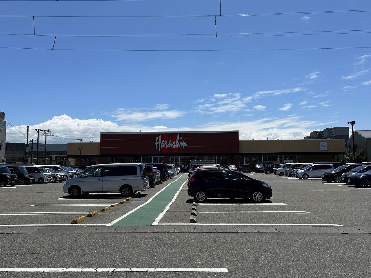 原信 近江店(スーパー)まで900m グランメール女池