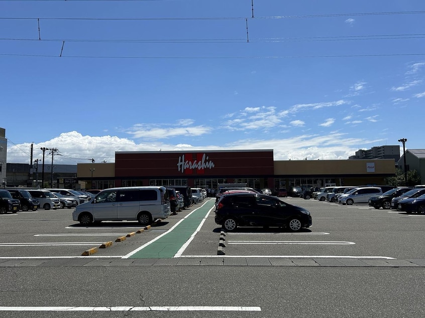 原信 近江店(スーパー)まで900m グランメール女池