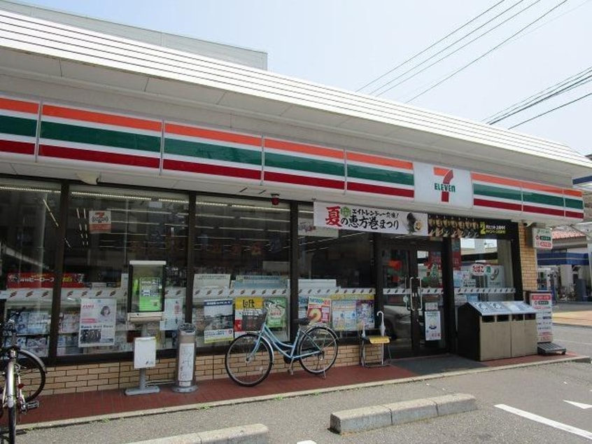 セブンイレブン新潟信濃町店(コンビニ)まで718m 関屋金衛町貸家