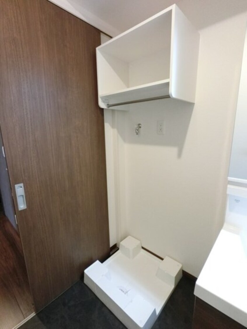 洗面室 収納棚付き洗濯機置き場 サンライトハイム陽東