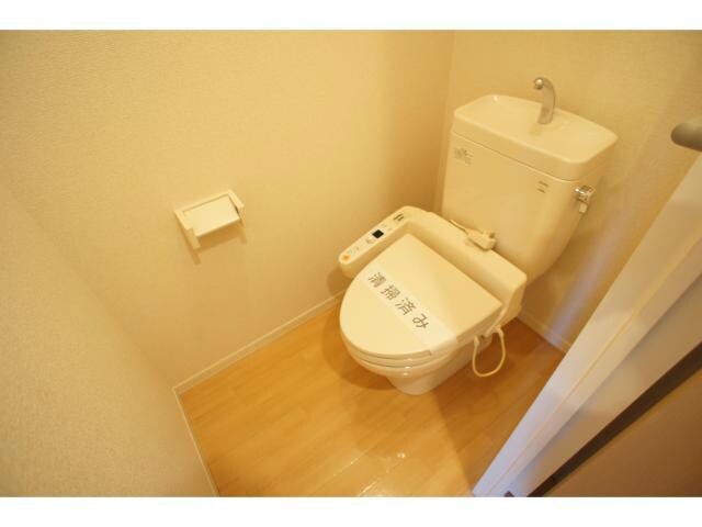 落ち着いた色調のトイレです ブルーメ古山