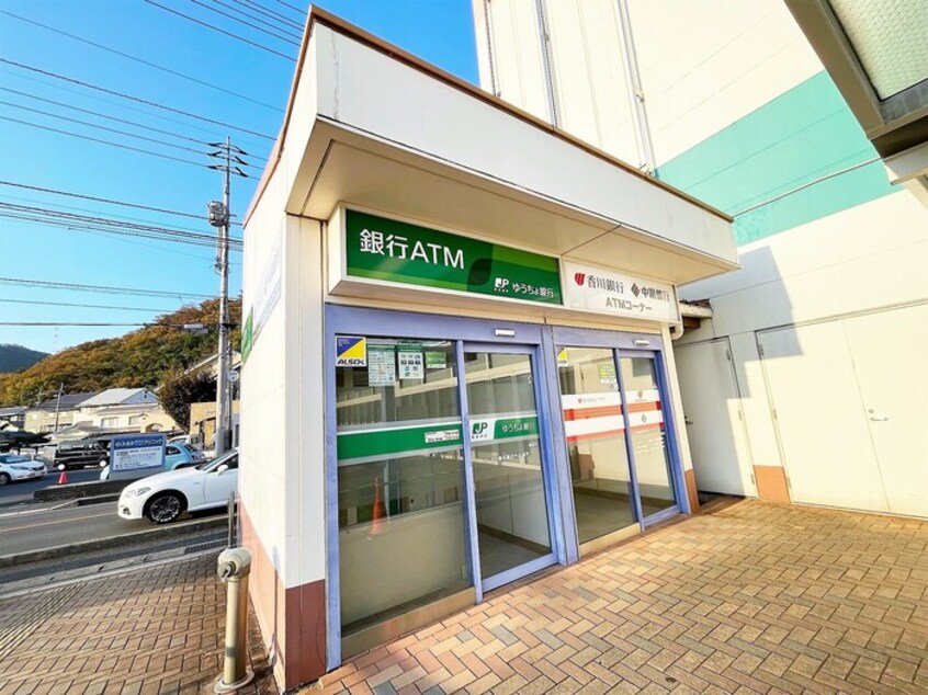 ゆうちょ銀行松山支店マルナカ栗林南店内出張所 ユニヴェールⅡ D棟