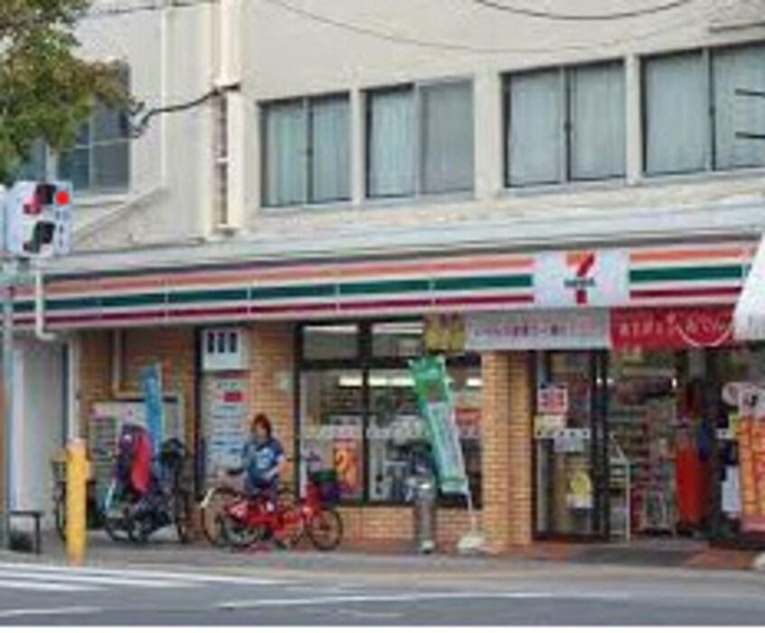 セブンイレブン 大阪市岡1丁目店(コンビニ)まで896m 大阪環状線/弁天町駅 徒歩5分 2階 築29年