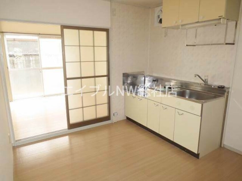  プレジール小﨑