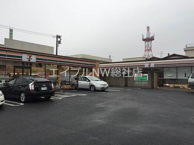 セブンイレブン東総社駅前店(コンビニ)まで394m ピュアライフ　B