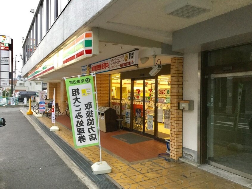 セブンイレブン京田辺河原店(コンビニ)まで454m グレイス　アニュー