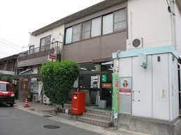 木津南垣外郵便局(郵便局)まで504m アルファコート