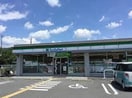 ファミリーマート京田辺市役所前店(コンビニ)まで584m ハウゼ・ノイン
