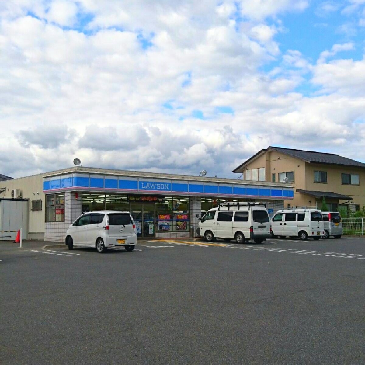 ローソン木津川州見台店(コンビニ)まで1408m エレガンシア