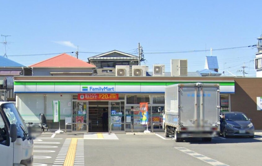 ファミリーマート木津駅前店(コンビニ)まで314m キンブリッジ木津南垣外