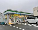 ファミリーマート精華光台店(コンビニ)まで563m アクシス光台