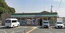 ファミリーマート木津川相楽店(コンビニ)まで415m リア　フォレスト　サガラ