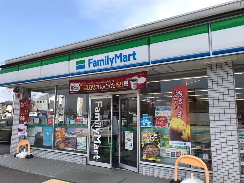 ファミリーマート木津梅美台店(コンビニ)まで388m ラ・ロシェル