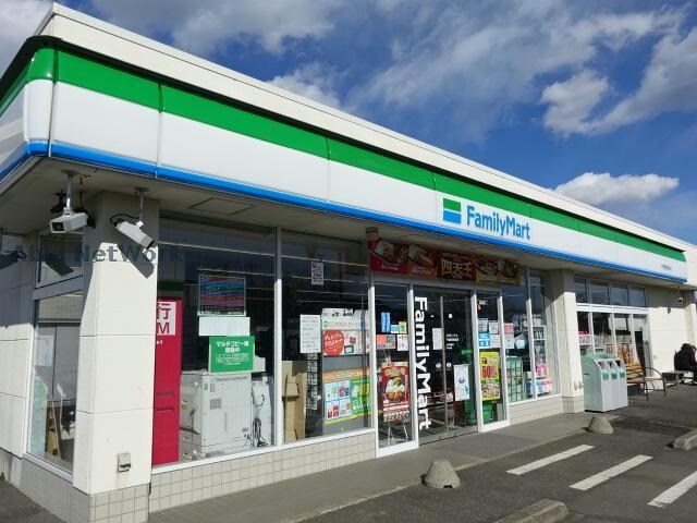 ファミリーマート登戸小学校前店(コンビニ)まで428m エスカレーズ