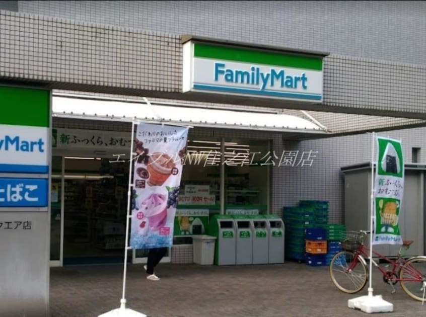 ファミリーマートコスモスクエア店(コンビニ)まで1205m 近鉄南港ガーデンハイツ21号棟