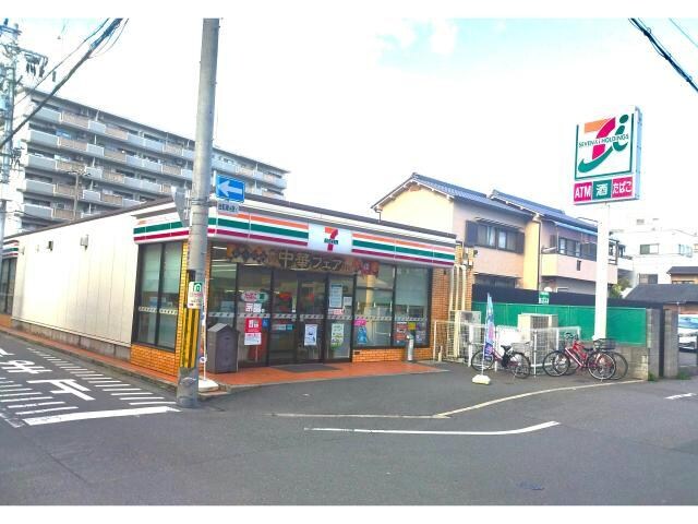 セブンイレブンJR塚本駅西店(コンビニ)まで106m レジュールアッシュ塚本