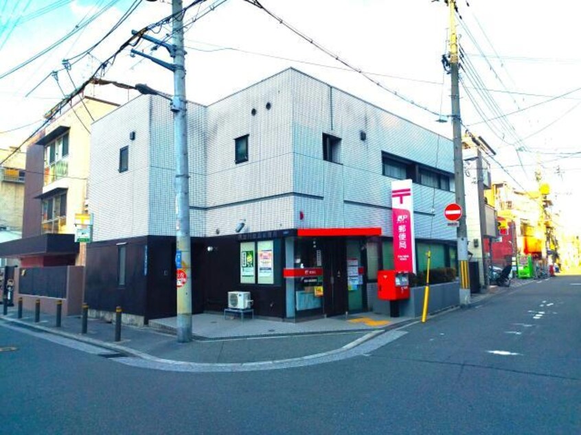 西淀川歌島郵便局(郵便局)まで450m みやぎマンション