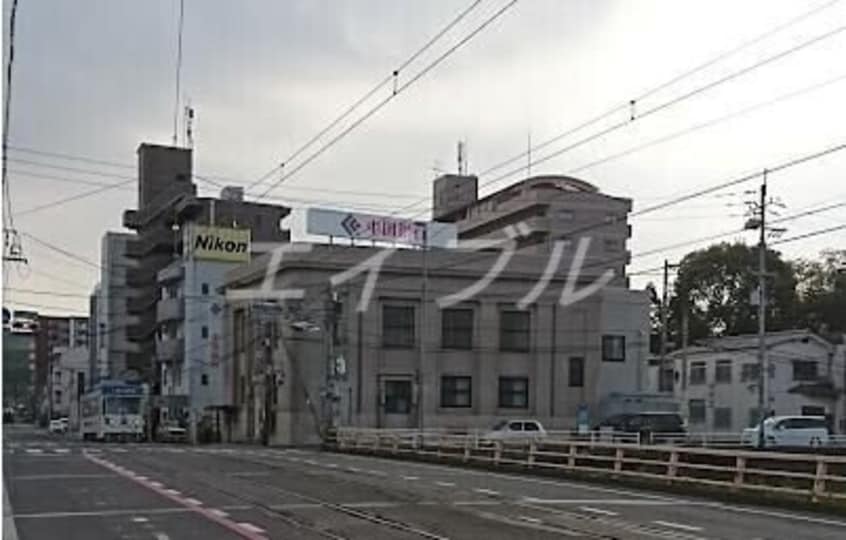 ファミリーマート築港新町店(コンビニ)まで531m ニコニコビル
