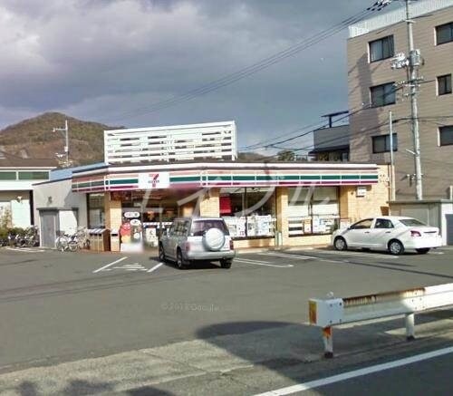 セブンイレブン岡山西大寺松崎店(コンビニ)まで753m フローラ都紀α