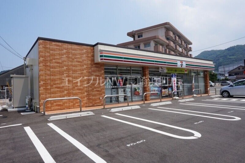 セブンイレブン時津溝川店(コンビニ)まで333m 長崎バス/浜田 1階 築13年