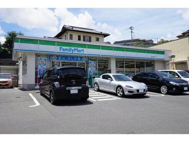 ファミリーマート長与駅前店(コンビニ)まで426m アーバンハイツB