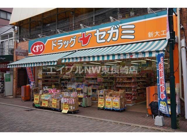 ドラッグセガミ新大工店(ドラッグストア)まで499m サニーヒルズ