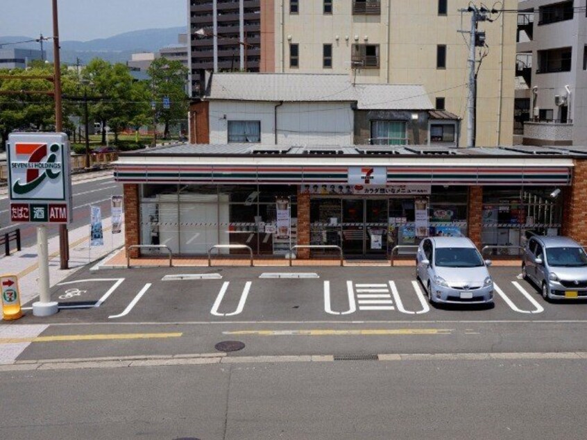 セブンイレブン長崎宝町店(コンビニ)まで28m アメニティープレイス小柳