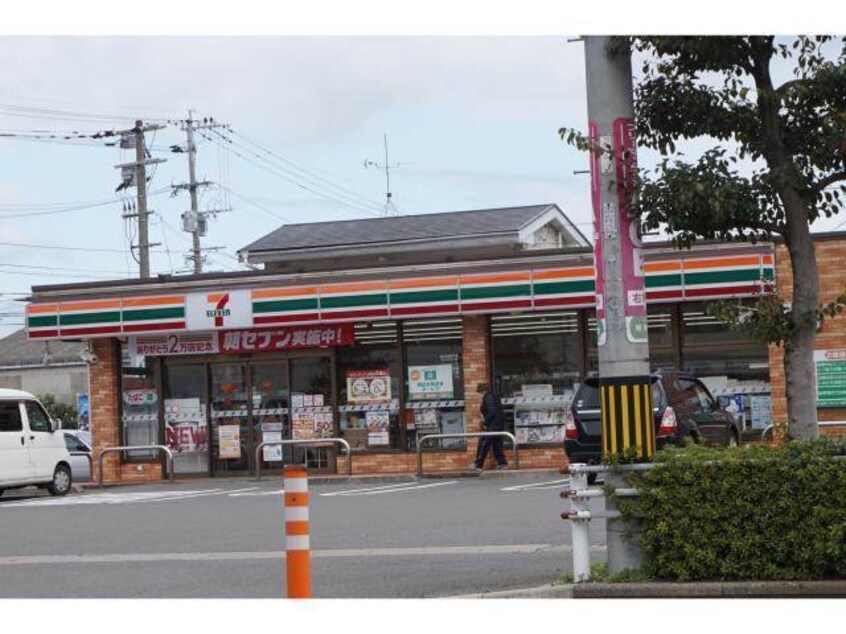 セブンイレブン時津日並郷店(コンビニ)まで695m サニーフラワーハウス