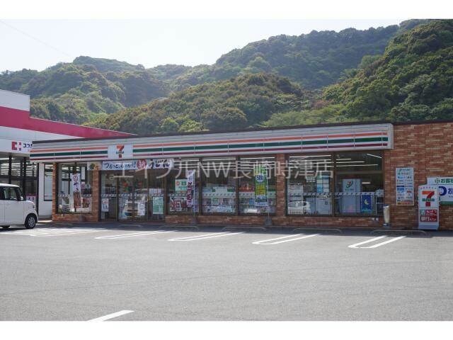 セブンイレブン琴海村松店(コンビニ)まで1408m ロータス シャイン